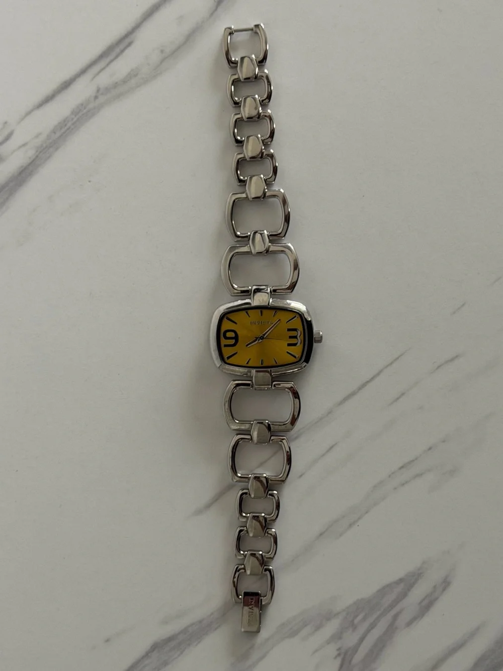 Vintage Invicta Silver Watch with Yellow Dial